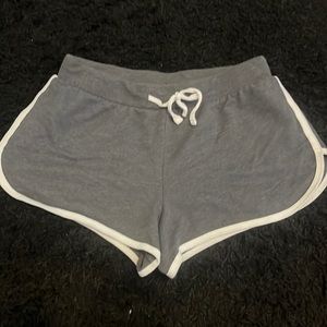 Grey Target shorts with white strings and outline.